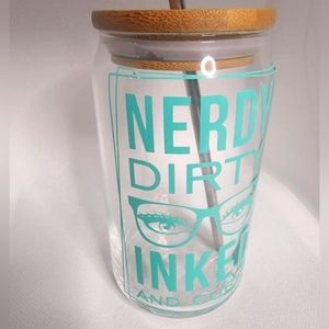 Nerdy reusable drink glass with lid and straw.